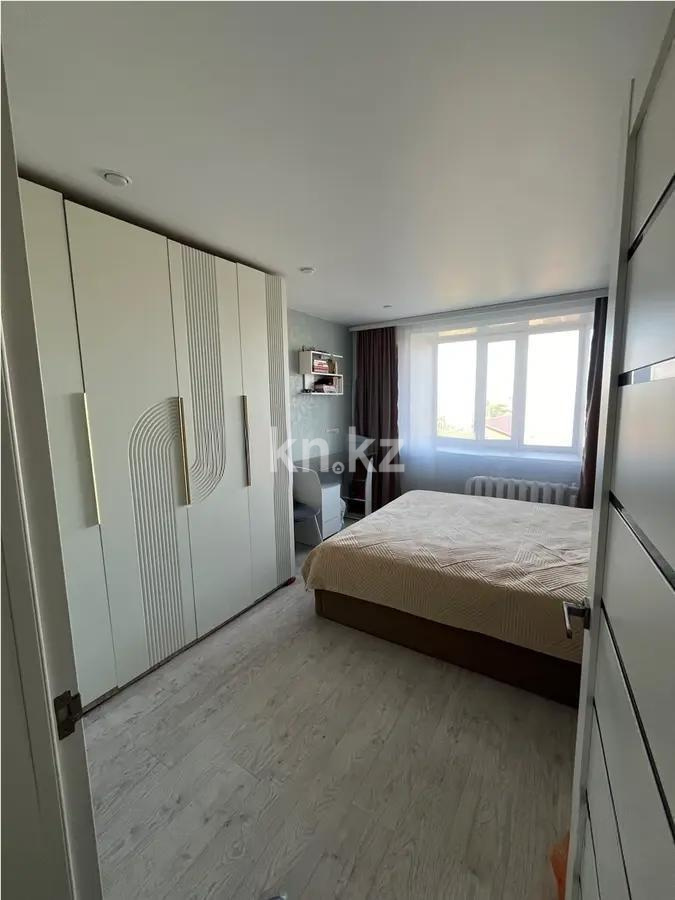 Продажа 2-комнатной квартиры, 57 м², ул. Кирпичная, дом  8г в Караганде - фото 2