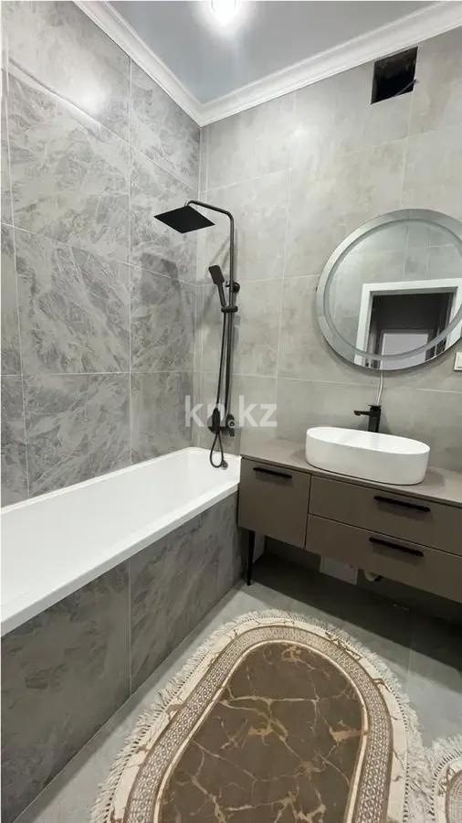 Продажа 2-комнатной квартиры, 56 м², ул. Толе би, дом  12/1 в Астане - фото 4