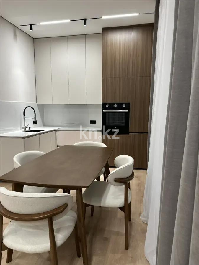 Продажа 2-комнатной квартиры, 54 м², ул. Сыганак, дом  28 в Астане - фото 2