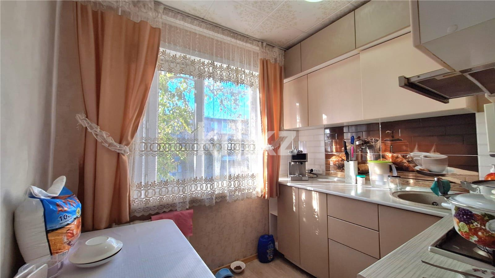 Продажа 3-комнатной квартиры, 62 м², 18 мкр. в Караганде - фото 7