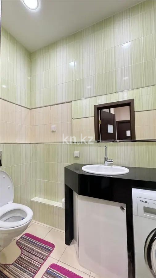 Продажа 2-комнатной квартиры, 63 м², ул. Сыганак, дом  62 в Астане - фото 4