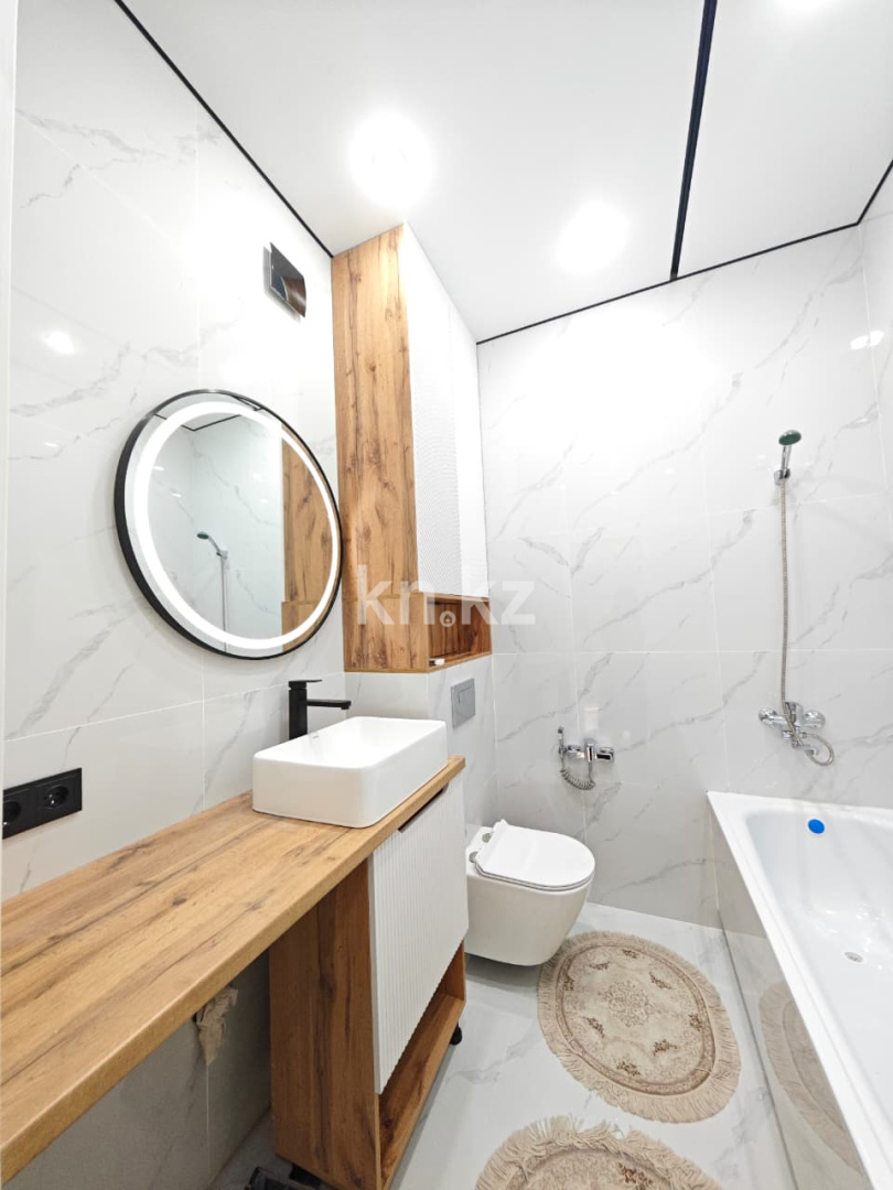 Продажа 2-комнатной квартиры, 59 м², ул. Университетская, дом  18 в Караганде - фото 12