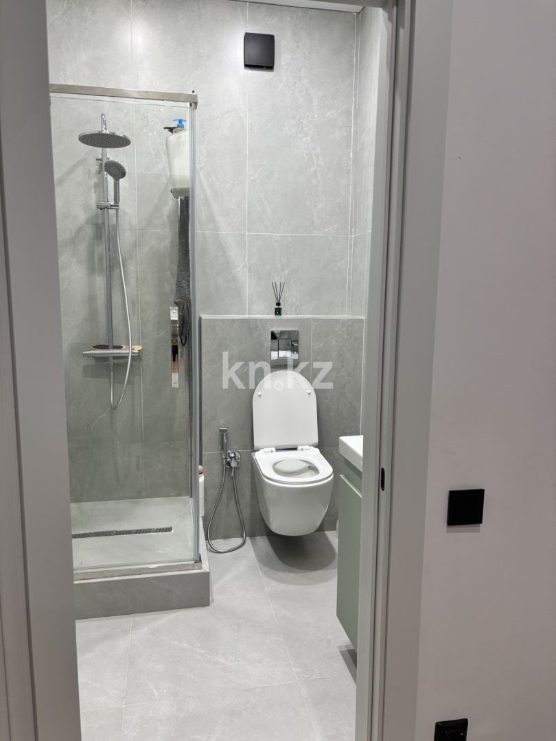 Продажа 4-комнатной квартиры, 105 м², ул. Кулкыбаева, дом  13 в Караганде - фото 6