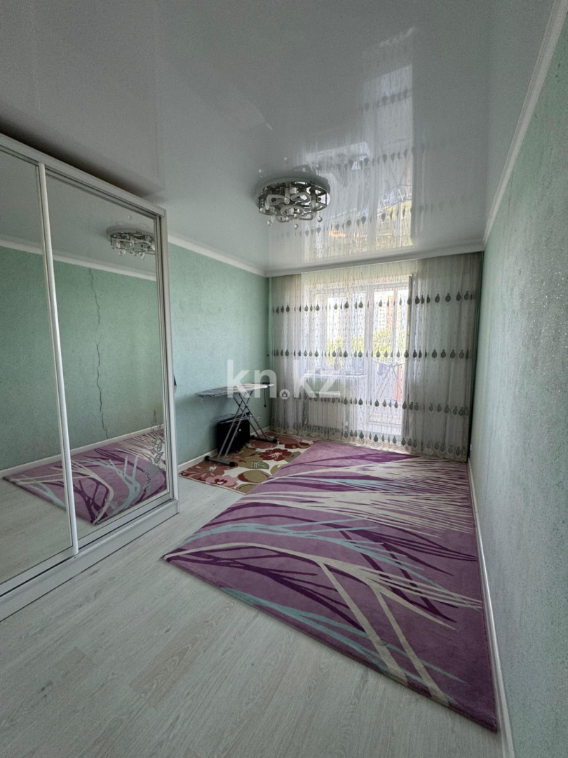 Продажа 2-комнатной квартиры, 56 м², ул. Сарыарка, дом  6 в Караганде - фото 6