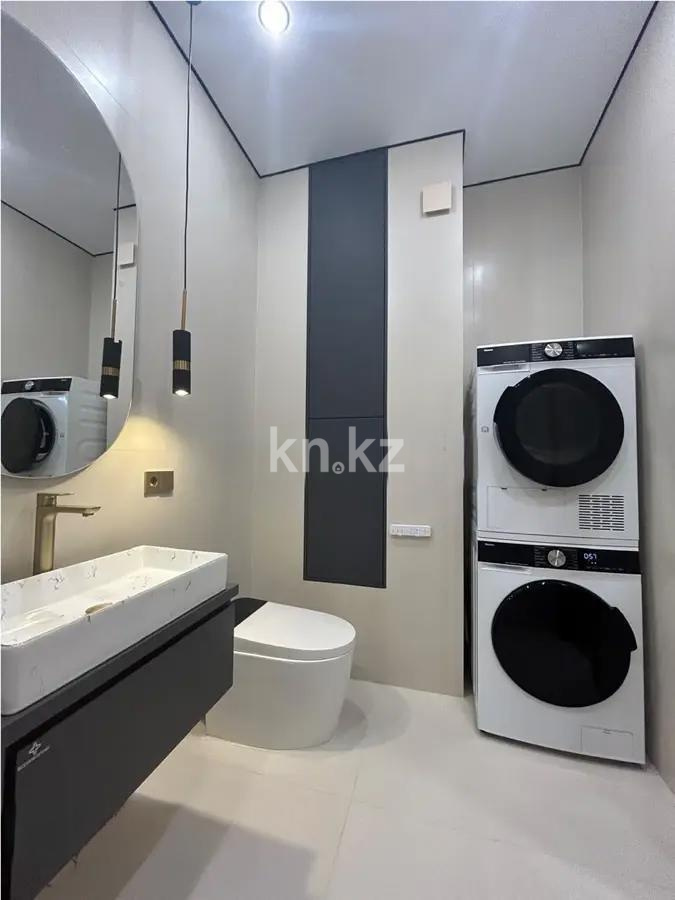 Продажа 2-комнатной квартиры, 53 м², ул. Тыныбаева, дом  18 в Астане - фото 5