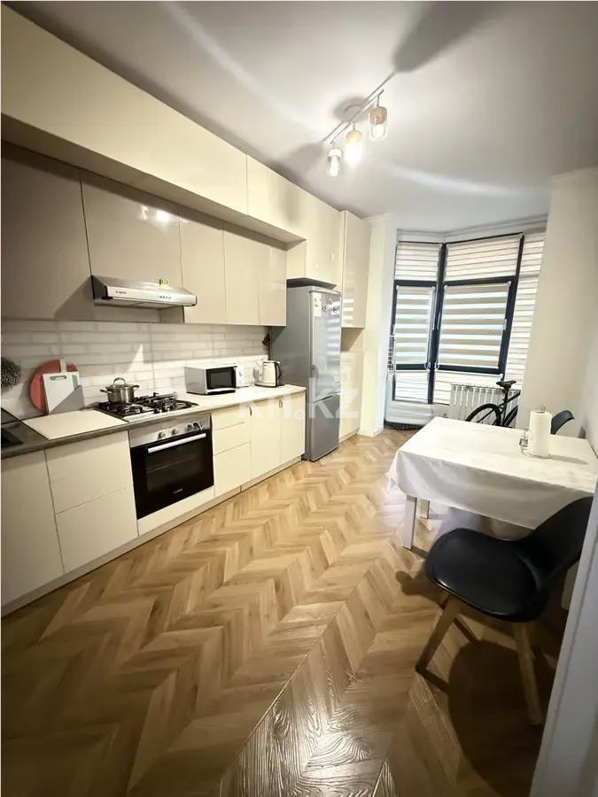 Продажа 1-комнатной квартиры, 49.4 м², мкр-н Думан-2, дом  30 в Алматы - фото 2