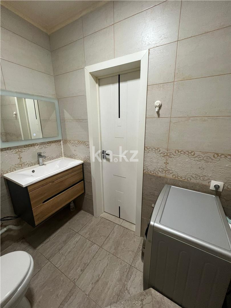 Продажа 2-комнатной квартиры, 57 м², ул. Сыганак в Астане - фото 8