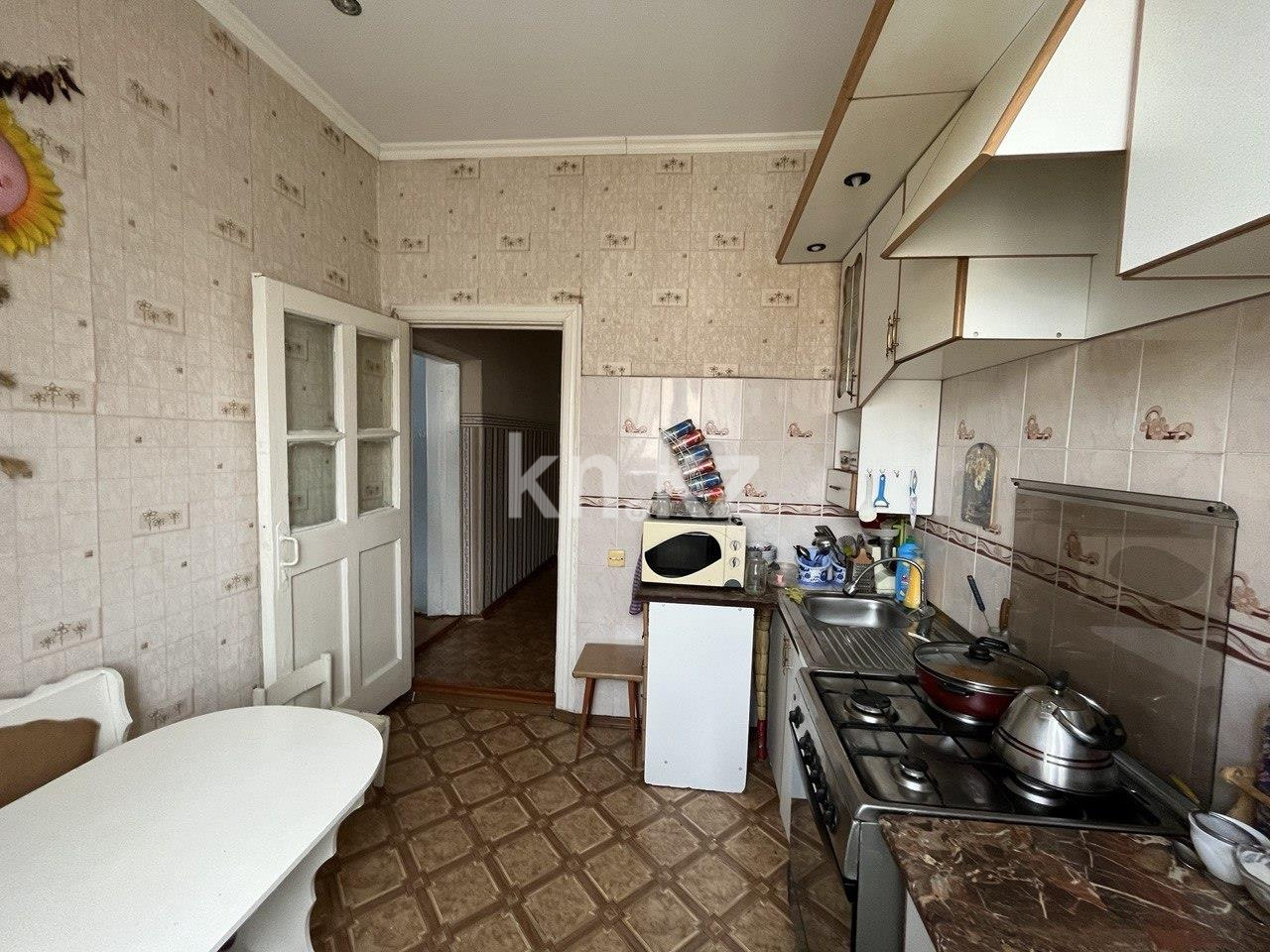 Продажа 2-комнатной квартиры, 62 м², ул. Ерубаева в Караганде - фото 5