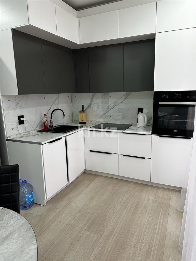 Продажа 2-комнатной квартиры, 65 м², ул. Сатыбалдина в Караганде - фото 9