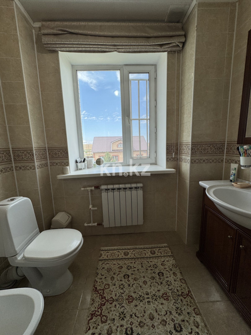 Продажа 6-комнатного дома, 338 м², ул. Молдагуловой в Караганде - фото 16