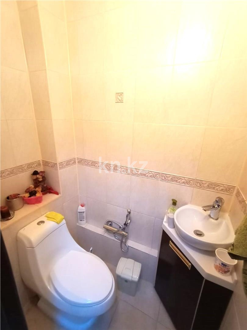 Продажа 2-комнатной квартиры, 63 м², ул. Кордай в Астане - фото 17