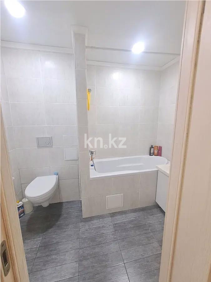 Продажа 2-комнатной квартиры, 56 м², ул. Таха Хусейна, дом  2 в Астане - фото 4