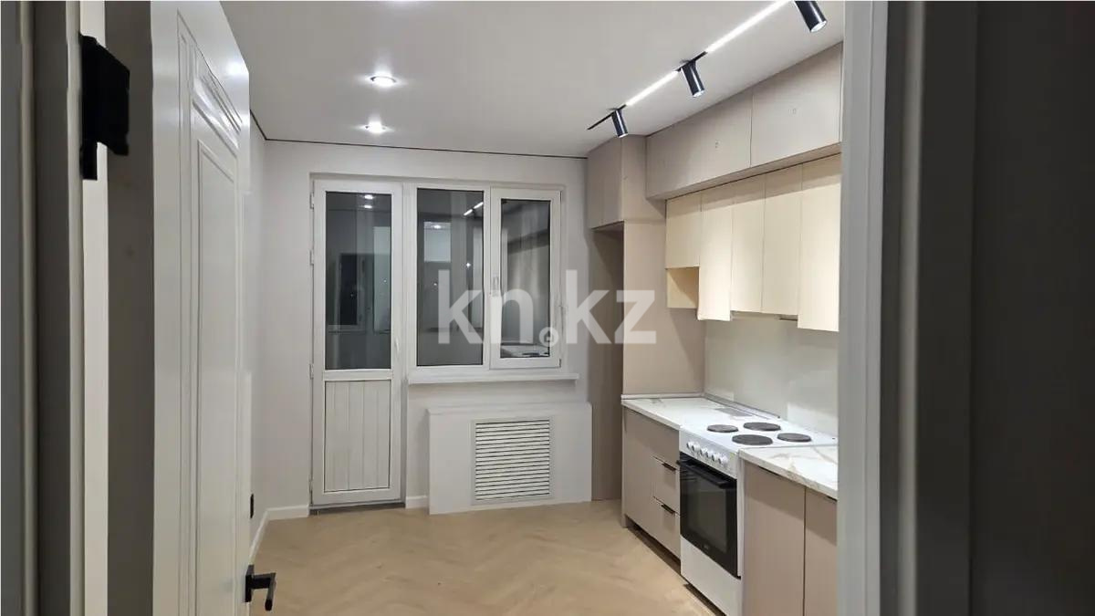 Продажа 2-комнатной квартиры, 56 м², ул. Толе би, дом  273а в Алматы - фото 2