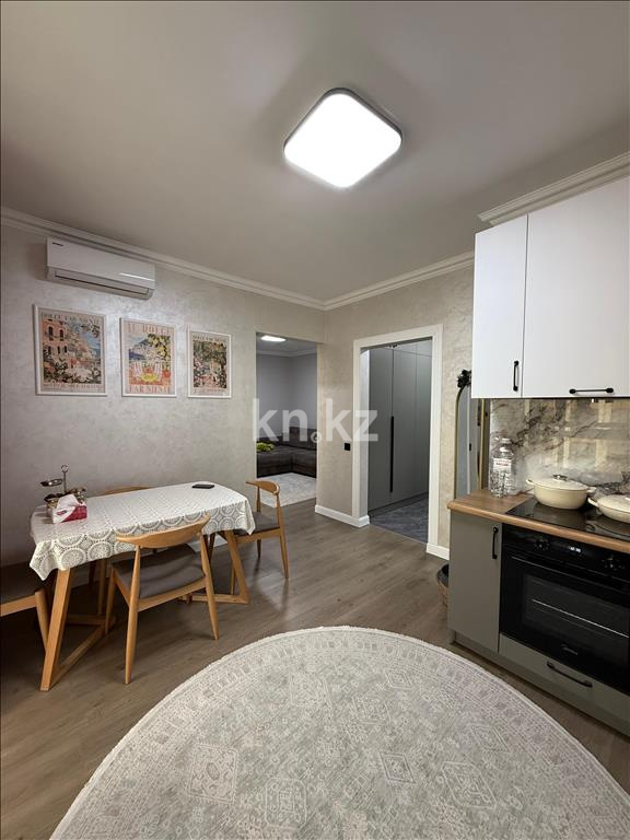 Продажа 2-комнатной квартиры, 52 м², ул. Толе би, дом  285/8 к13 - ул. Утеген батыра в Алматы - фото 15