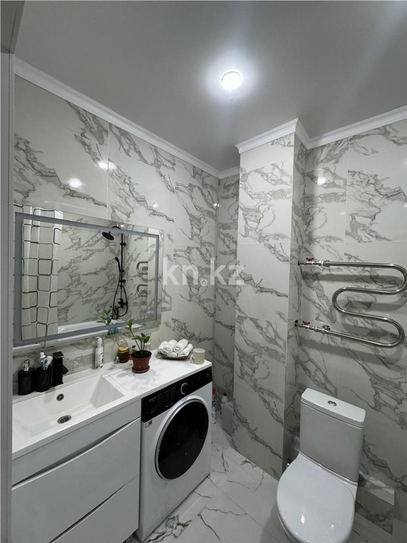 Продажа 2-комнатной квартиры, 55 м², ул. Сыганак в Астане - фото 6