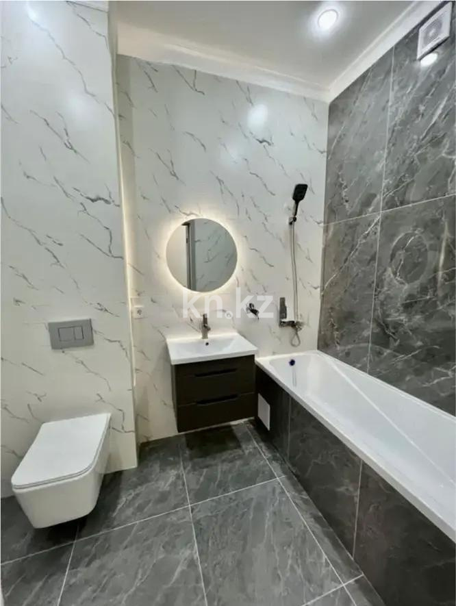 Продажа 2-комнатной квартиры, 41 м², ул. Толе би, дом  12/1 в Астане - фото 4