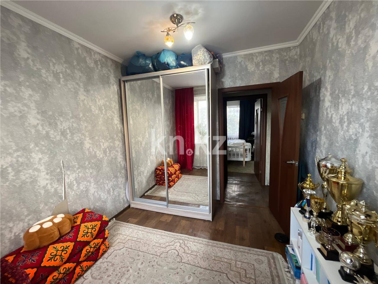 Продажа 4-комнатной квартиры, 77 м², ул. Карла Маркса в Караганде - фото 3