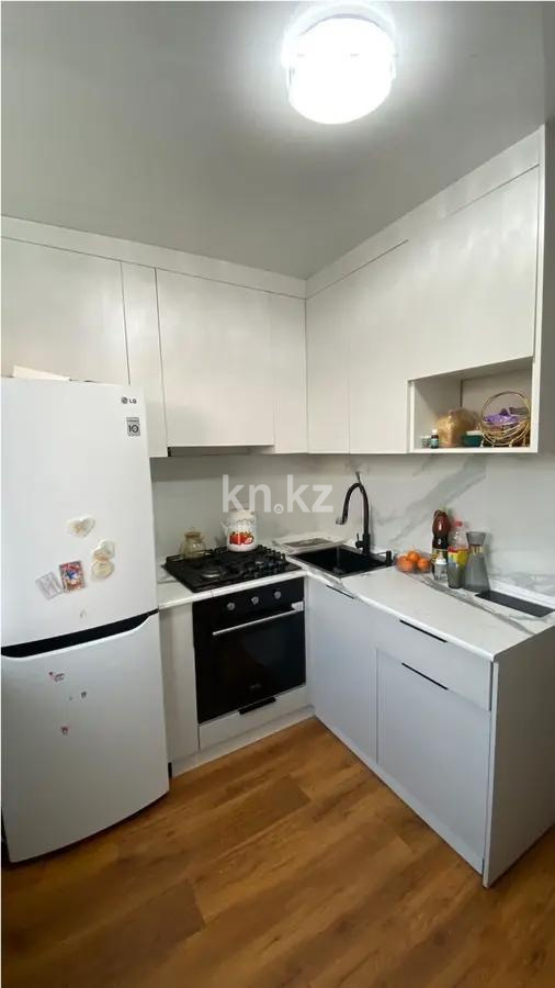 Продажа 3-комнатной квартиры, 49 м², 15 мкр., дом  2 в Караганде - фото 4