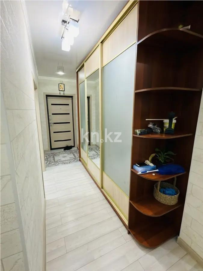 Продажа 2-комнатной квартиры, 58 м², ул. Сыганак, дом  2 в Астане - фото 4