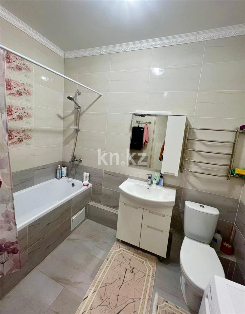Продажа 1-комнатной квартиры, 39 м², ул. Казыбек би в Астане - фото 4