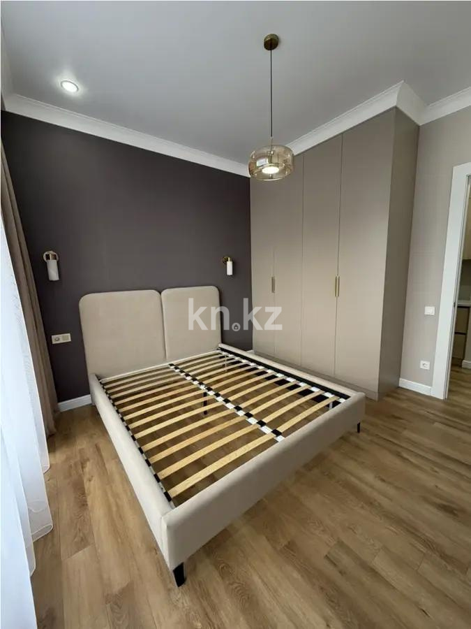 Продажа 2-комнатной квартиры, 52 м², ул. Сыганак, дом  28 в Астане - фото 2