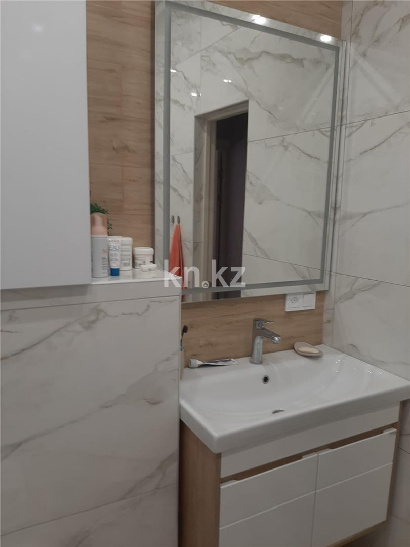 Продажа 4-комнатной квартиры, 117 м², пр. Строителей, дом  33/4 в Караганде - фото 14