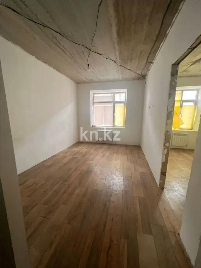 Продажа 2-комнатной квартиры, 65 м², 067 учетный квартал, дом  456/1 в Караганде - фото 2