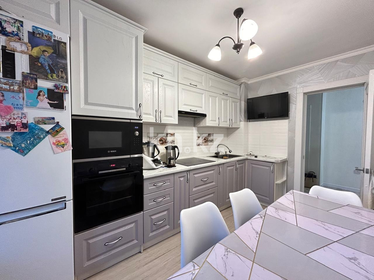 Продажа 5-комнатной квартиры, 107 м², ул. Муканова в Караганде - фото 25