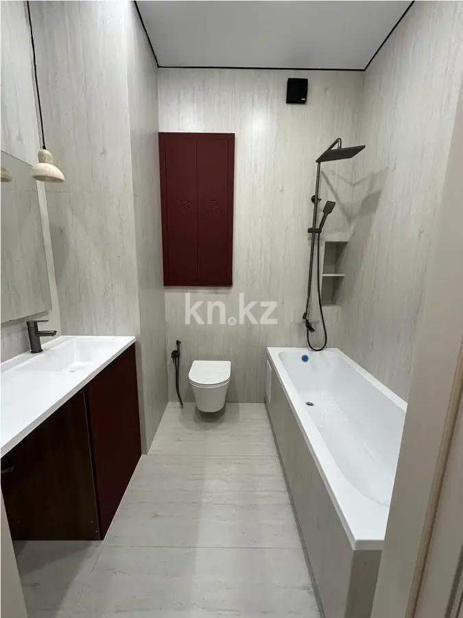 Продажа 2-комнатной квартиры, 52 м², ул. Сыганак, дом  28 в Астане - фото 4