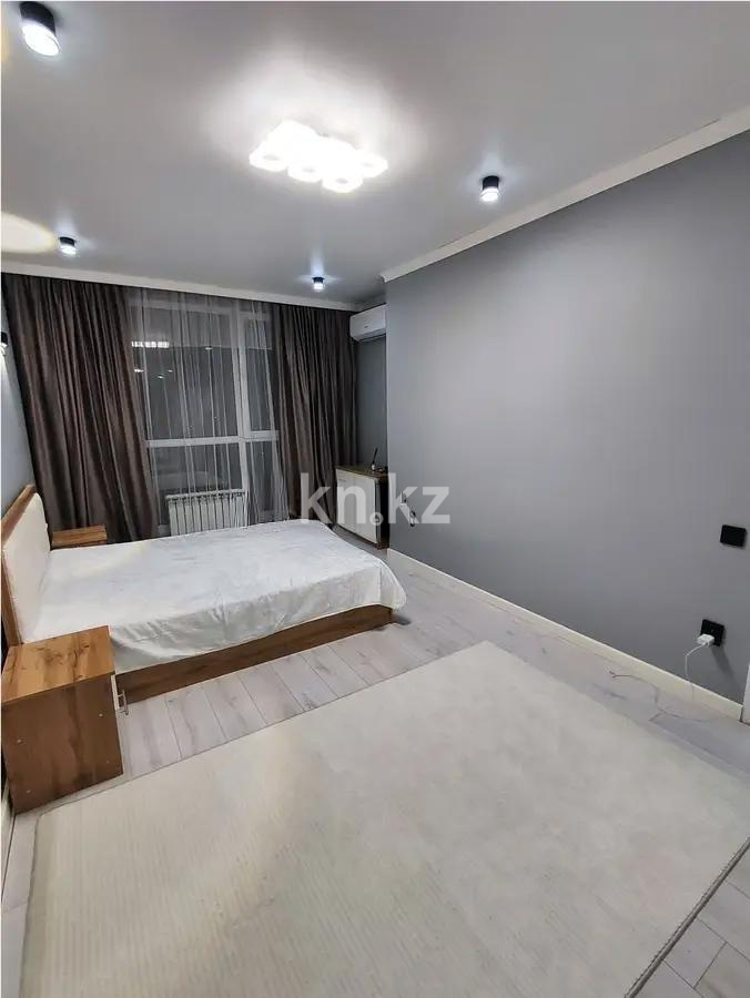 Продажа 2-комнатной квартиры, 50 м², ул. Толе би, дом  285/8 стр в Алматы - фото 2
