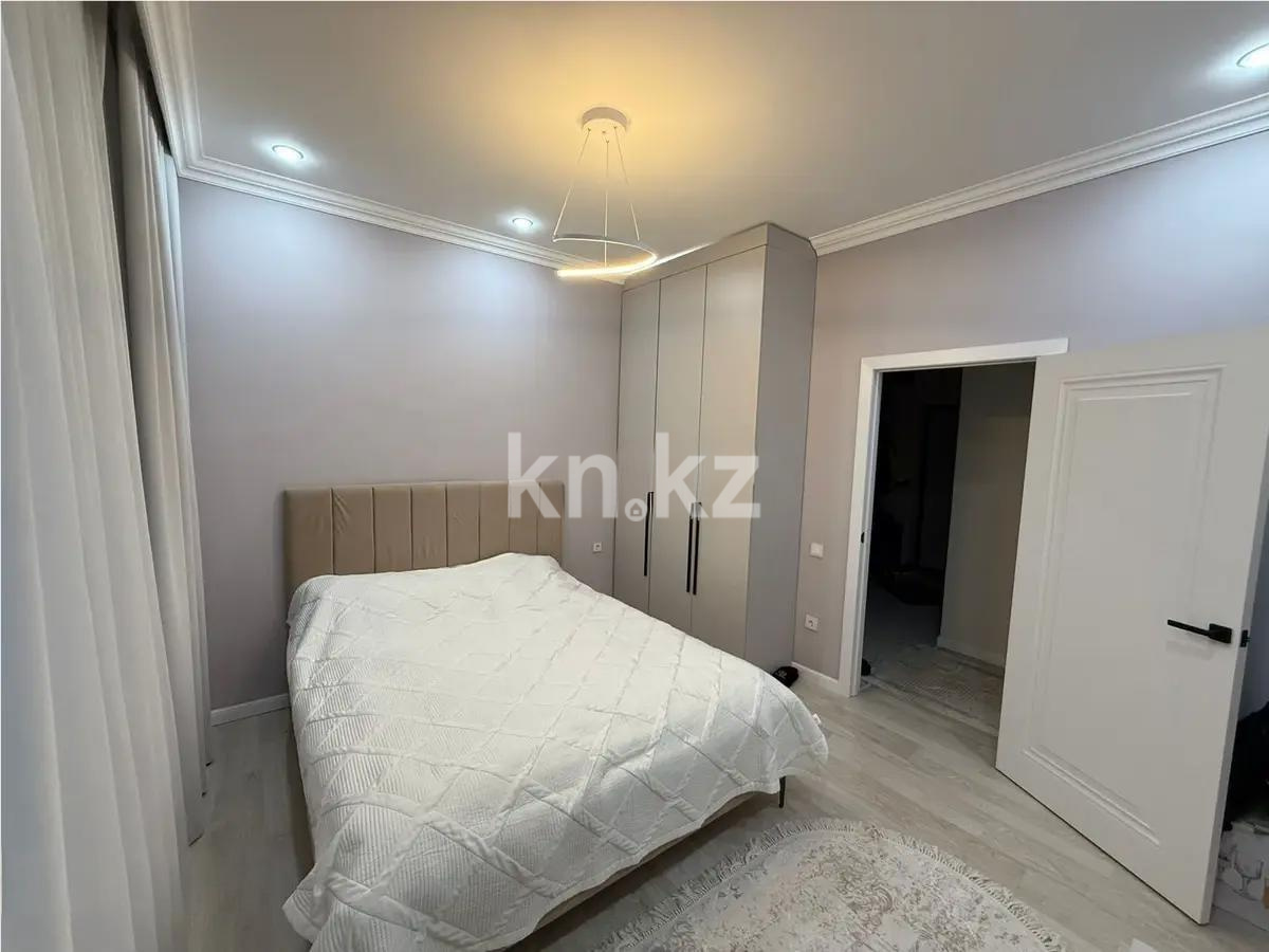 Продажа 2-комнатной квартиры, 56 м², ул. Толе би, дом  14 в Астане - фото 2