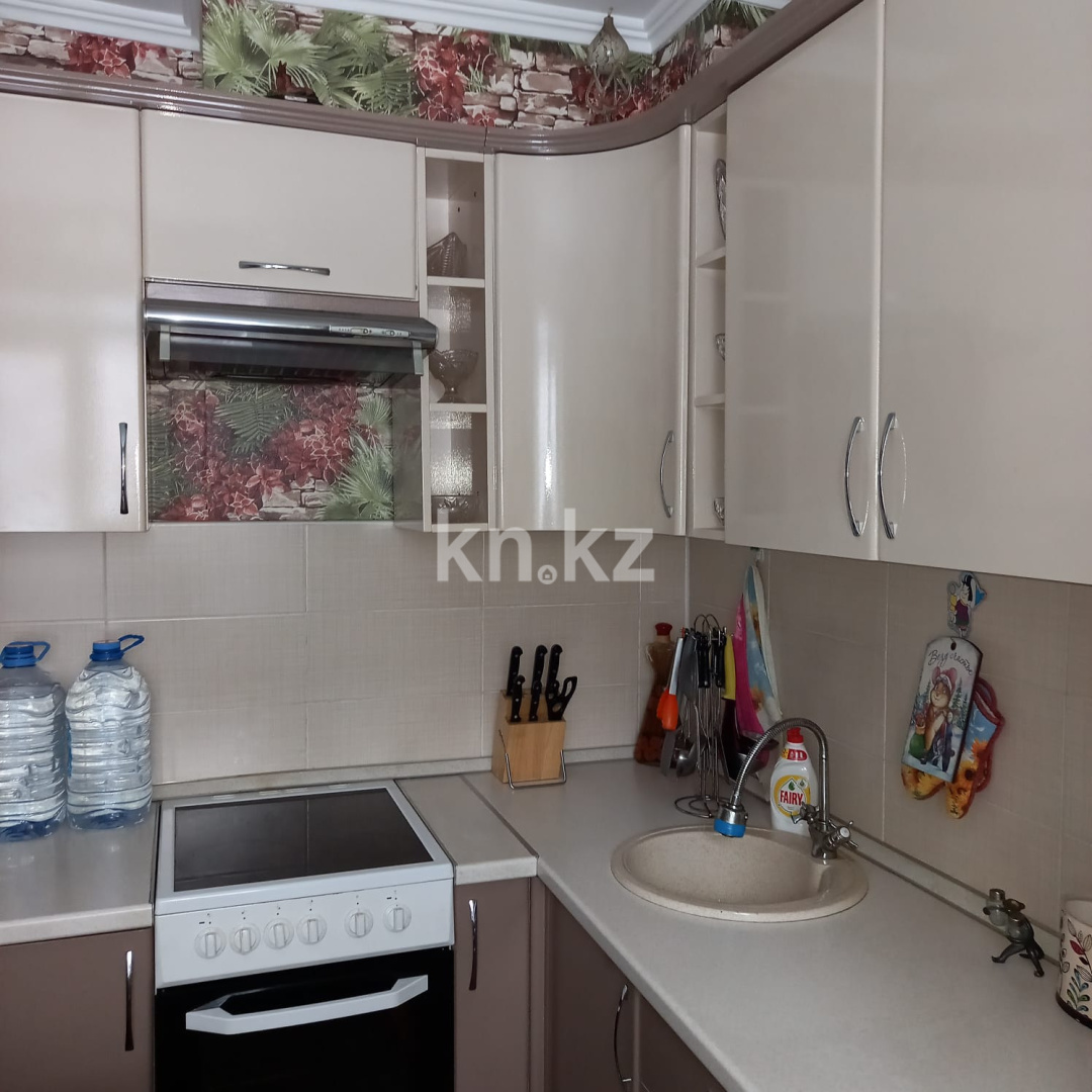 Продажа 1-комнатной квартиры, 36 м², ул. Аманжолова, дом  71а в Караганде - фото 6