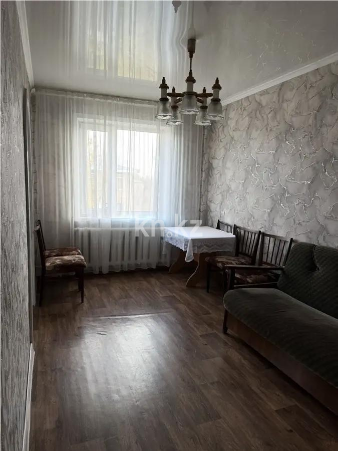 Продажа 4-комнатной квартиры, 61 м², мкр-н 22, дом  4 в Караганде - фото 2