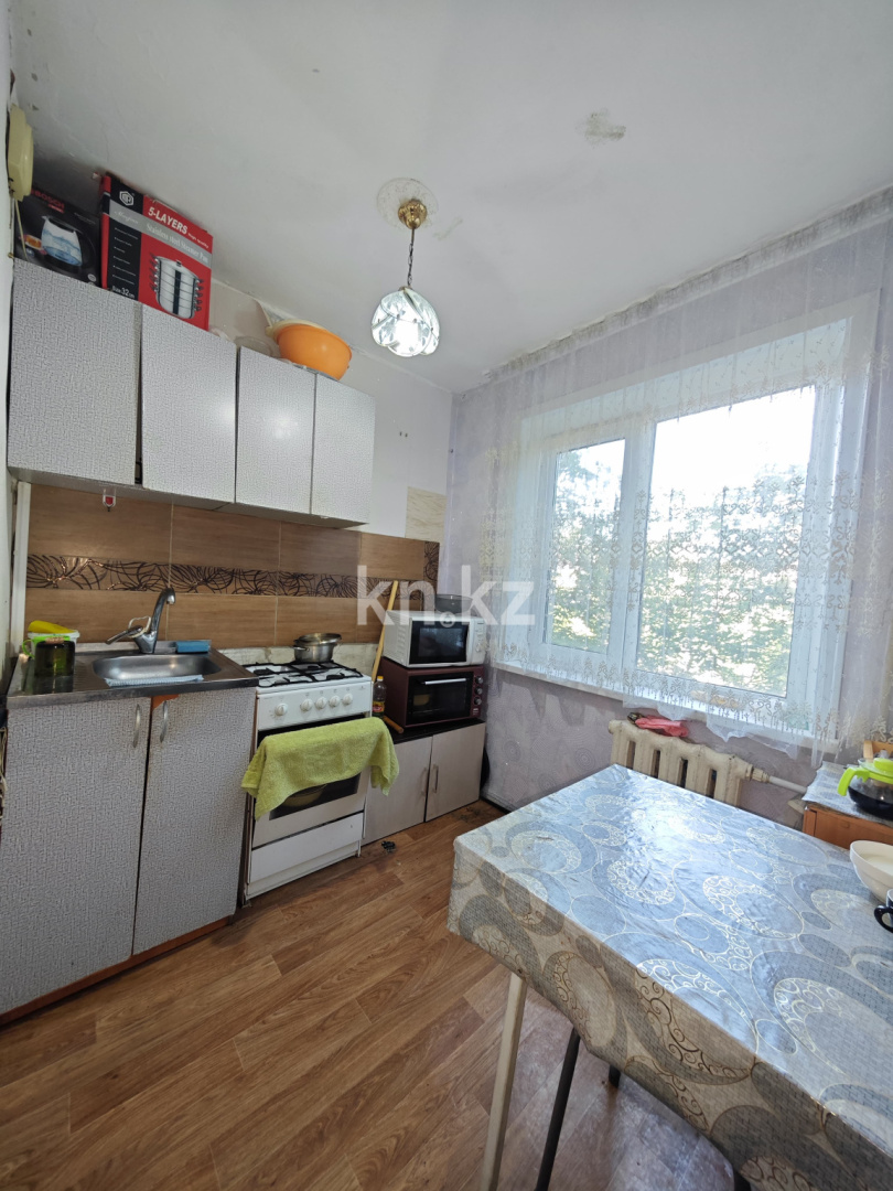 Продажа 2-комнатной квартиры, 48 м², мкр-н 16, дом  31 в Караганде - фото 4