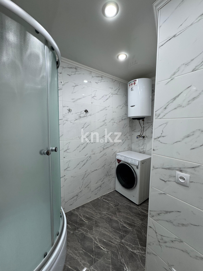 Продажа 2-комнатной квартиры, 55.4 м², ул. Муканова в Караганде - фото 17