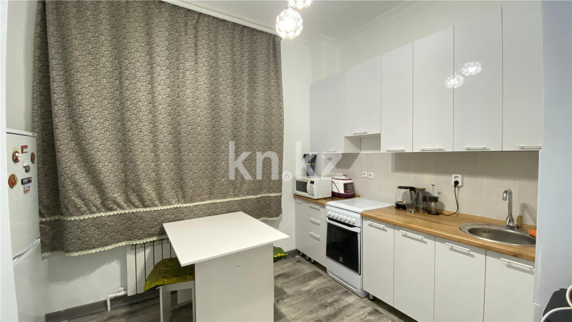 Продажа 2-комнатной квартиры, 57 м², ул. Дюсембекова в Караганде - фото 5