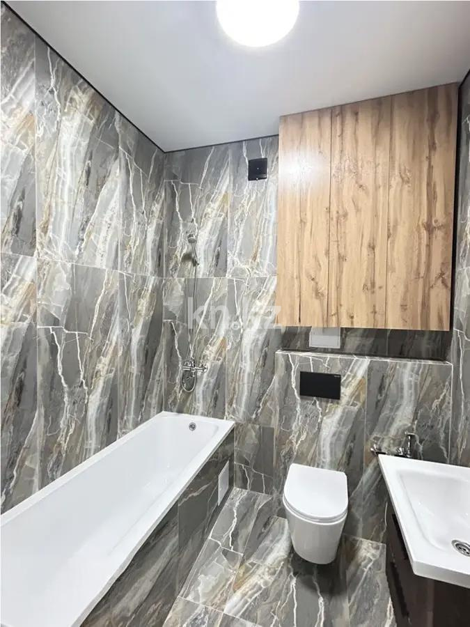 Продажа 1-комнатной квартиры, 39 м², ул. Сызганова, дом  1/1 в Астане - фото 3