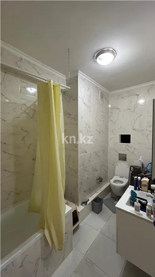 Продажа 2-комнатной квартиры, 56 м², пр. Кошкарбаева, дом  45а в Астане - фото 3