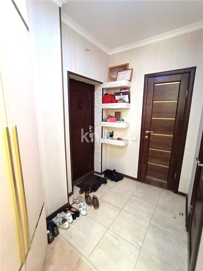 Продажа 2-комнатной квартиры, 63 м², ул. Кордай в Астане - фото 21