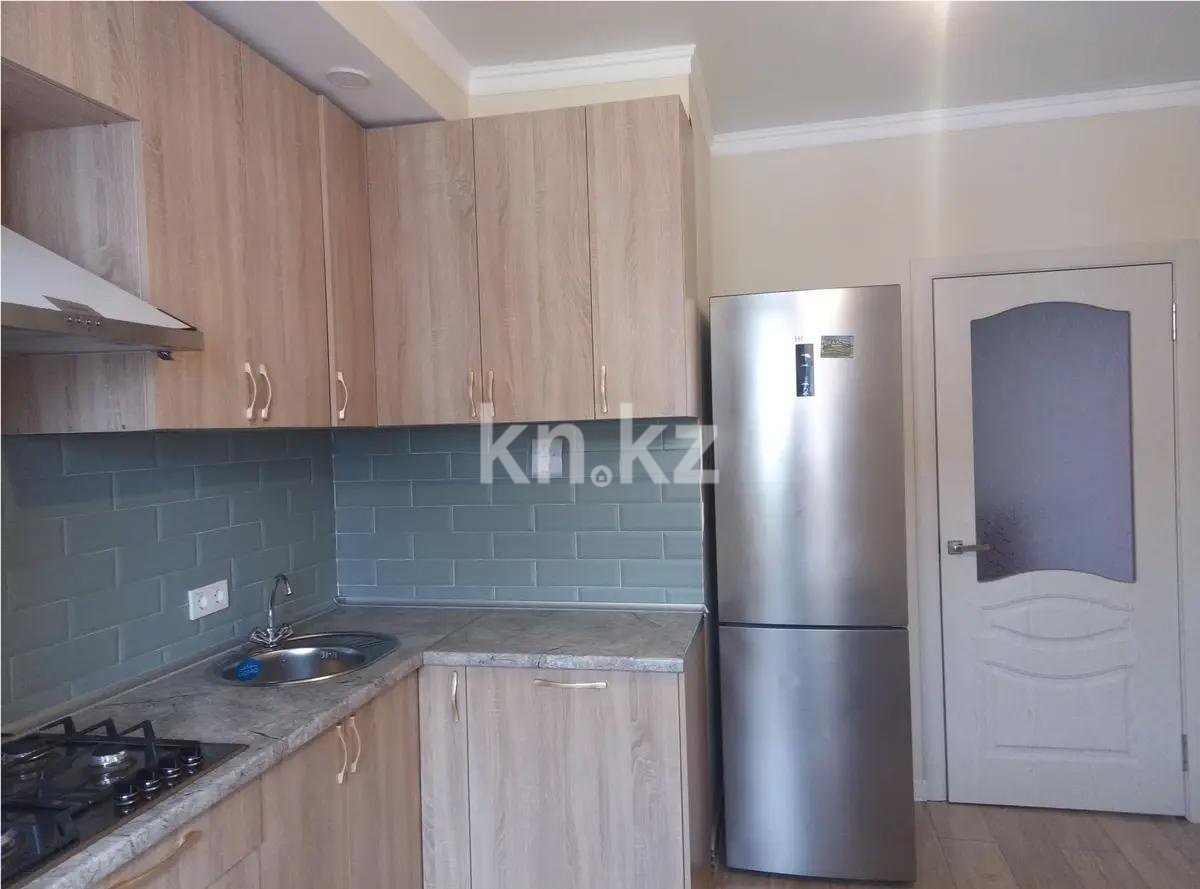 Продажа 2-комнатной квартиры, 58 м², ул. Толе би, дом  4 в Алматы - фото 2