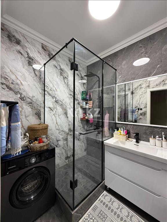 Продажа 2-комнатной квартиры, 52 м², ул. Толе би, дом  285/8 к13 - ул. Утеген батыра в Алматы - фото 18