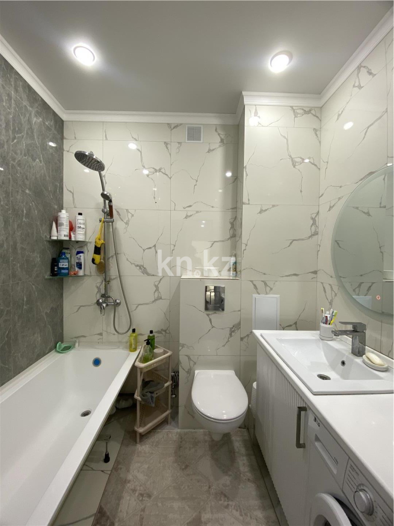 Продажа 2-комнатной квартиры, 60 м², пр. Тауелсыздык в Астане - фото 9