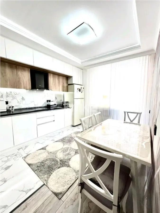 Продажа 3-комнатной квартиры, 95 м², пр. Кошкарбаева, дом  48 в Астане - фото 4