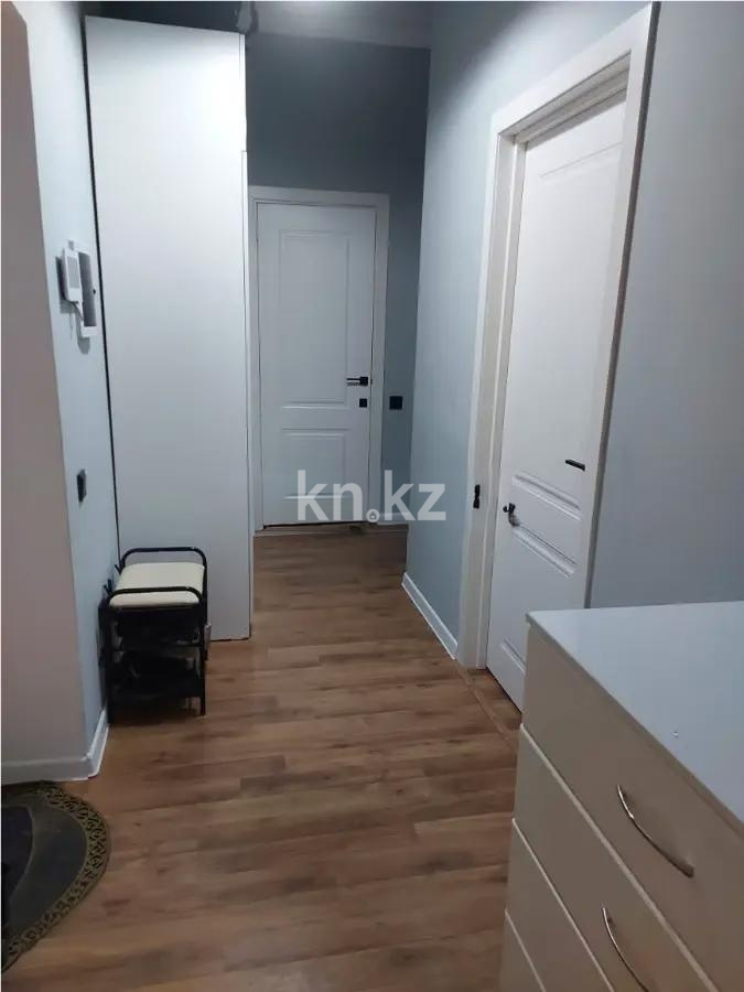 Продажа 2-комнатной квартиры, 52 м², ул. Толе би, дом  12/1 в Астане - фото 4