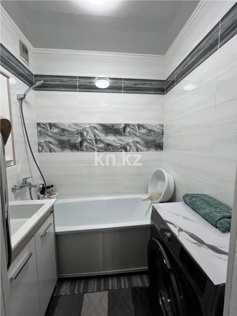 Продажа 2-комнатной квартиры, 53 м², мкр. Гульдер-1 в Караганде - фото 13