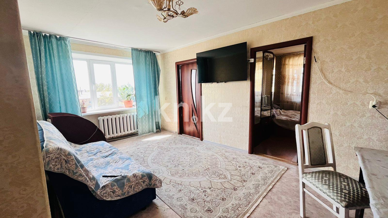 Продажа 4-комнатной квартиры, 63 м², мкр-н 14 в Караганде - фото 2