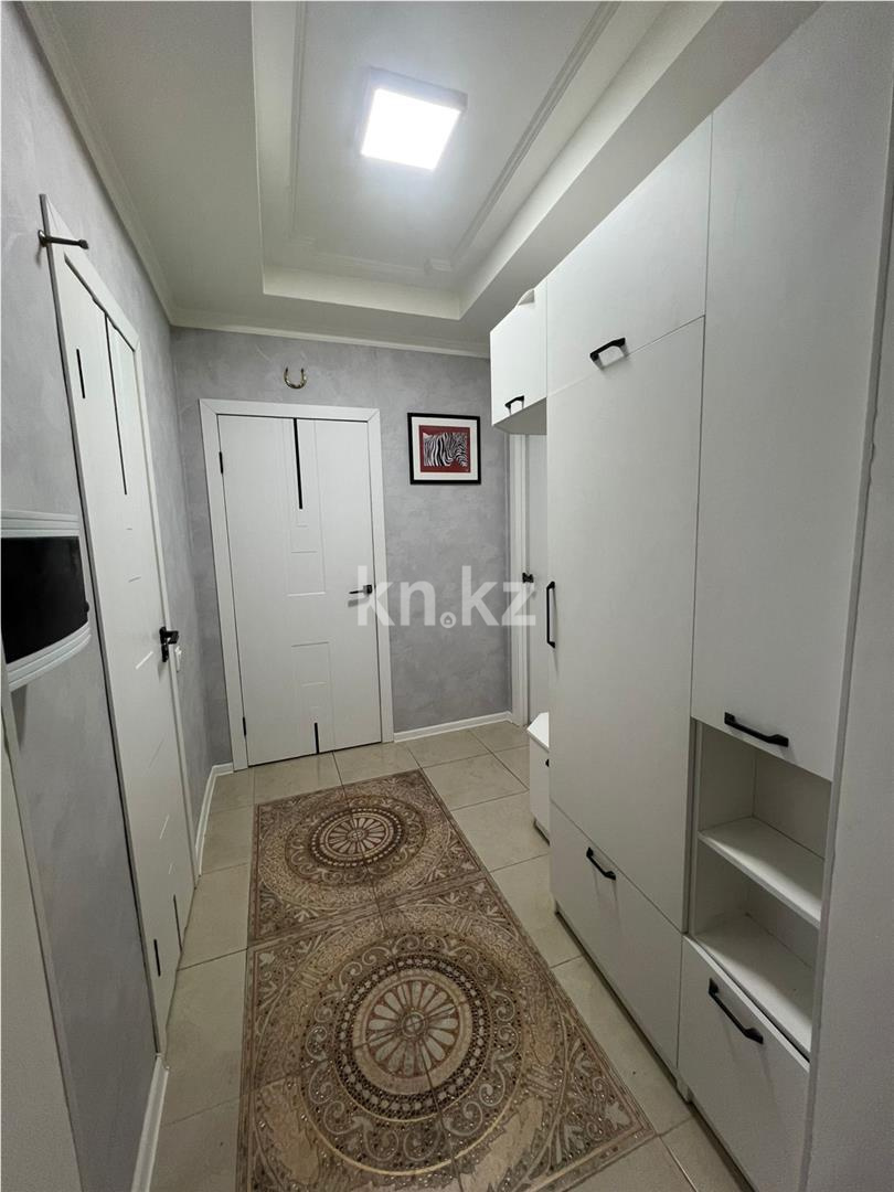 Продажа 2-комнатной квартиры, 57 м², ул. Сыганак в Астане - фото 5