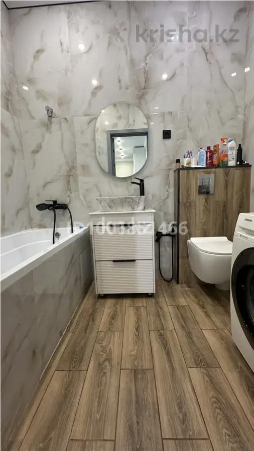 Продажа 2-комнатной квартиры, 64.25 м², ул. Казыбек би, дом  7 в Астане - фото 5