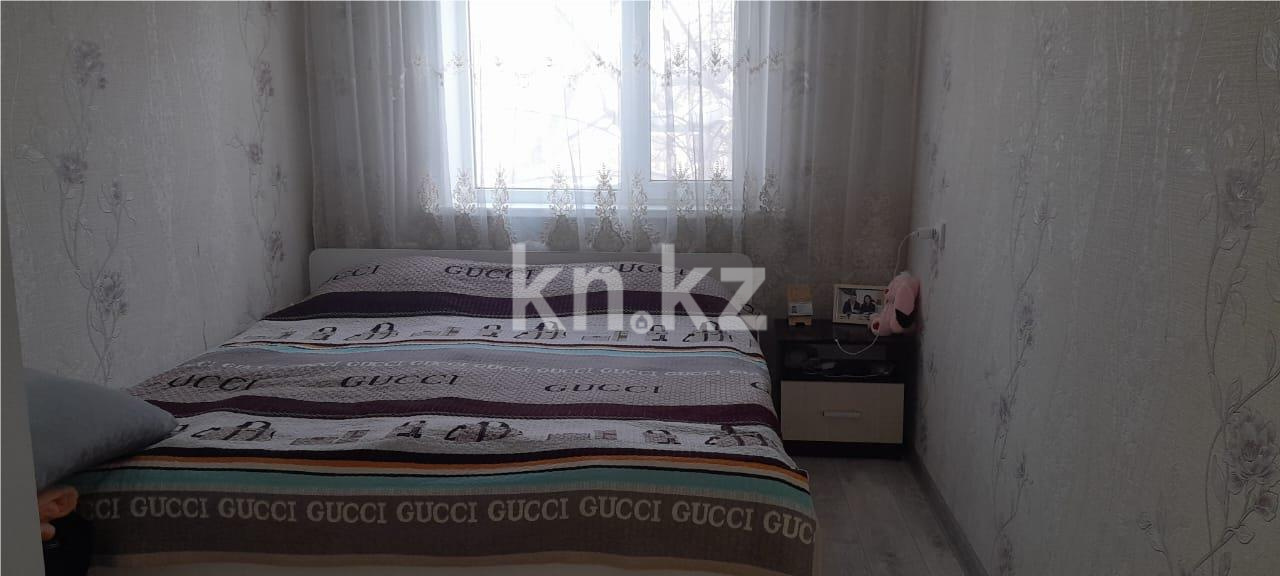 Продажа 4-комнатной квартиры, 77 м², ул. Гапеева в Караганде - фото 4