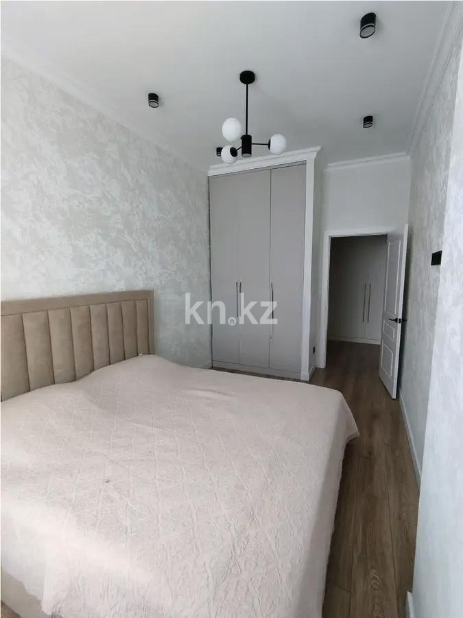 Продажа 2-комнатной квартиры, 60 м², ул. Толе би, дом  14 в Астане - фото 2
